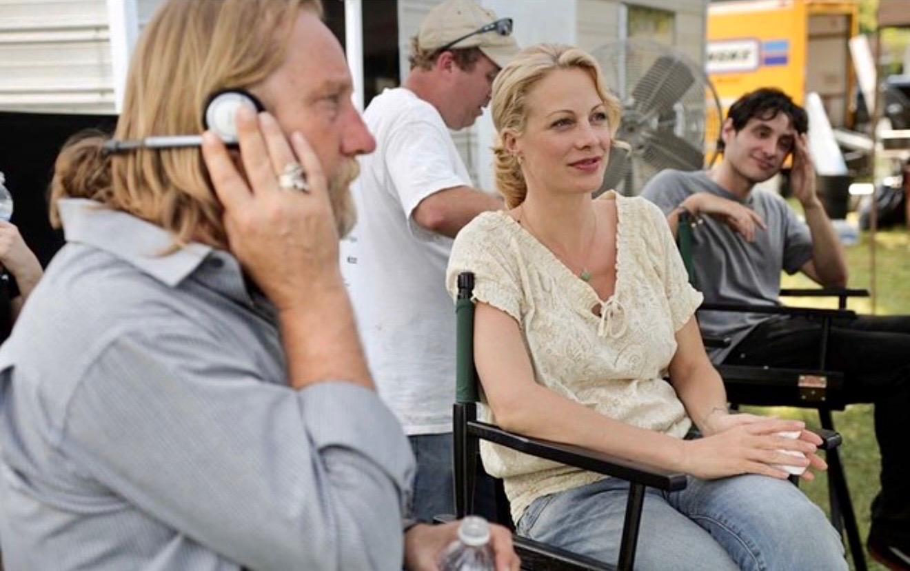 Cast and crew between takes on set